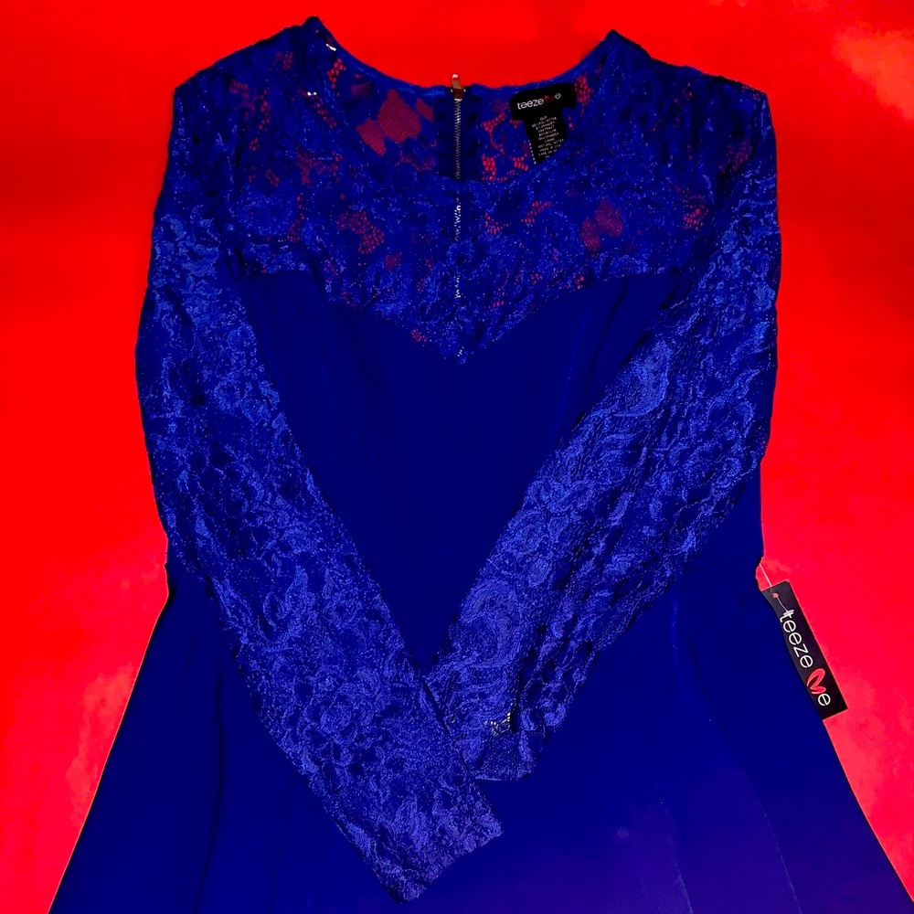 Girls size 15/16 blue dress with beautiful lace detail. New/Never Worn.